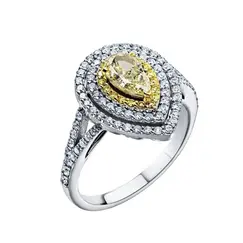 Кольцо с желтым Fancy Yellow и белыми бриллиантами из белого золота 585 пробы