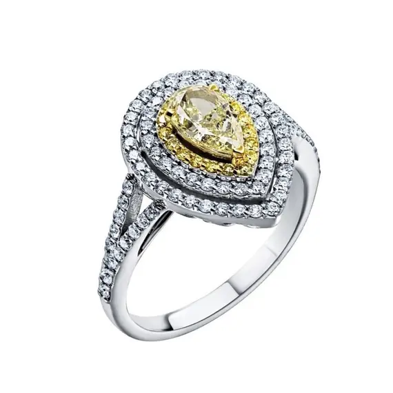 Кольцо с желтым Fancy Yellow и белыми бриллиантами из белого золота 585 пробы